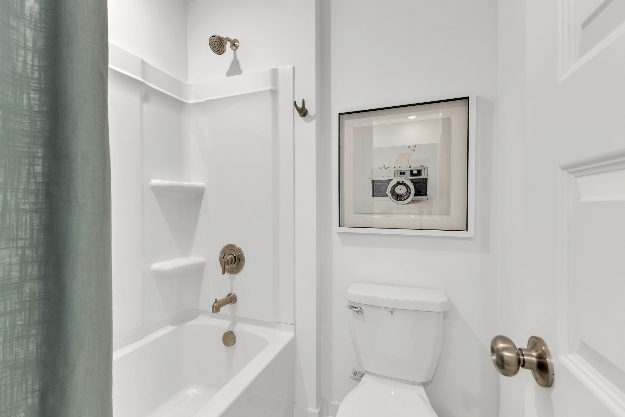 6356 North New Hope Road Hermitage, TN 37076 - Photo 35 of 37 a bathroom with a bathtub and toilet