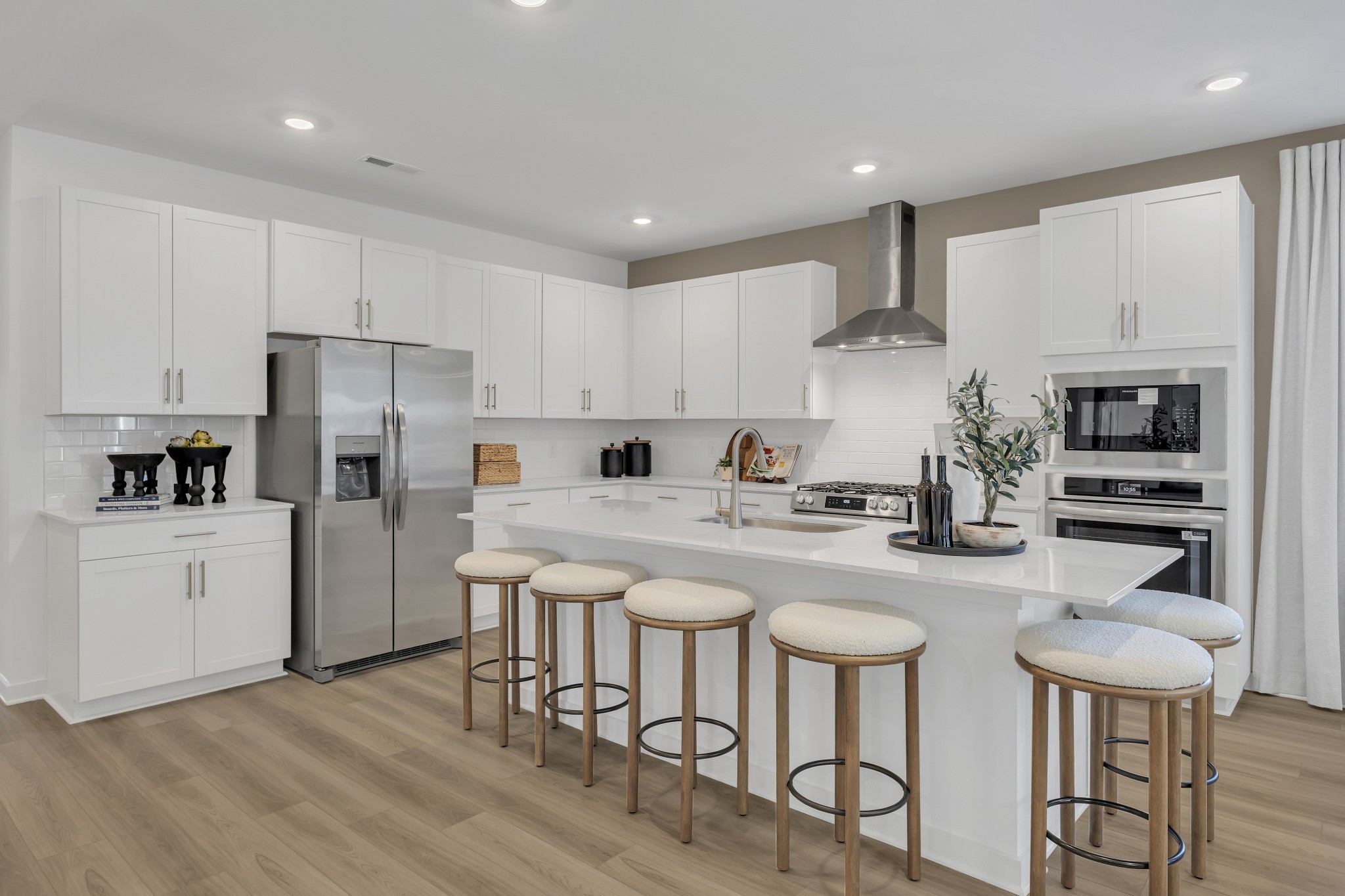 6356 North New Hope Road Hermitage, TN 37076 - Photo 5 of 37 a kitchen with stainless steel appliances granite countertop a white cabinets and a refrigerator