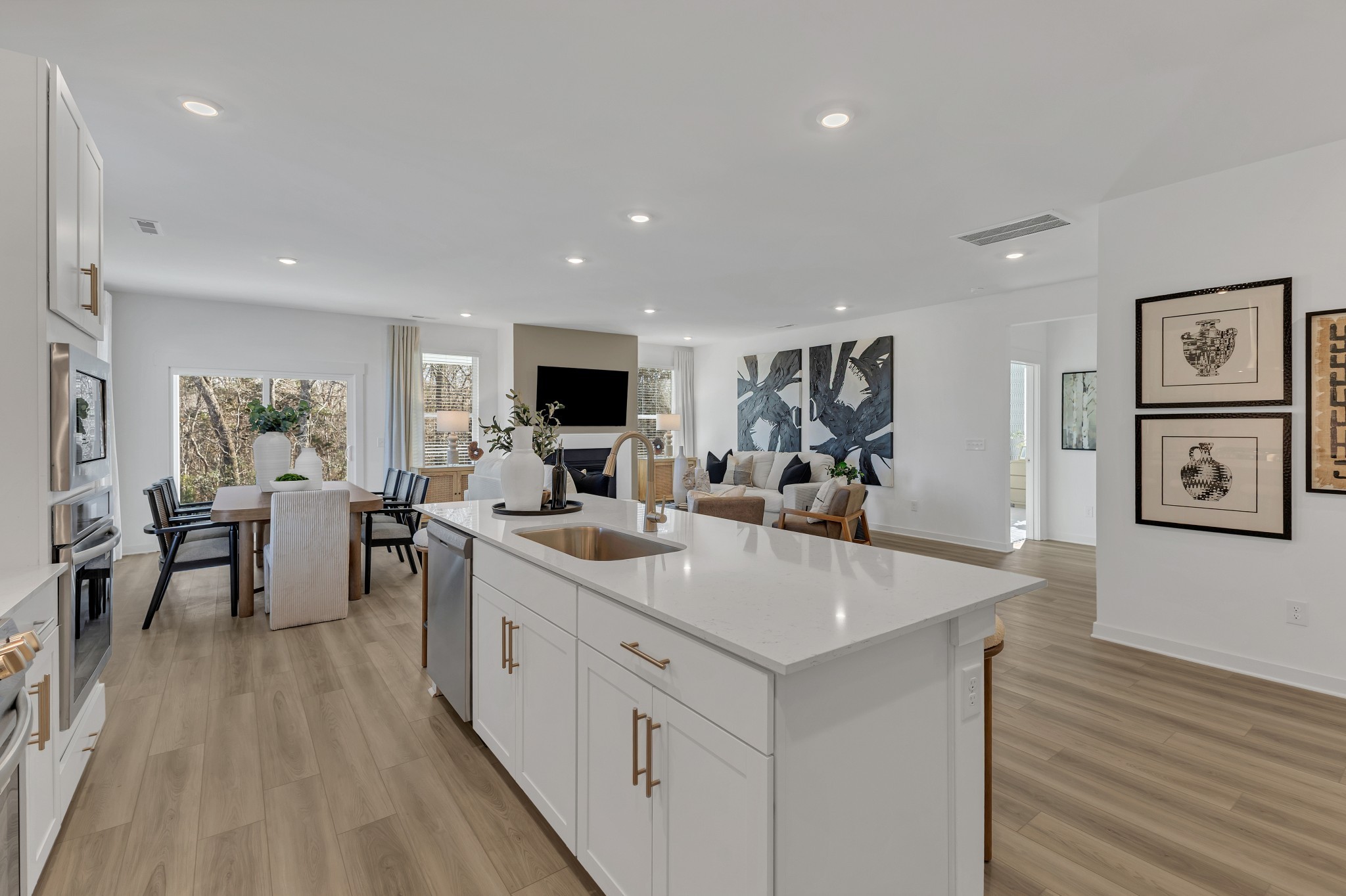 6356 North New Hope Road Hermitage, TN 37076 - Photo 9 of 37 a large white kitchen with sink and microwave