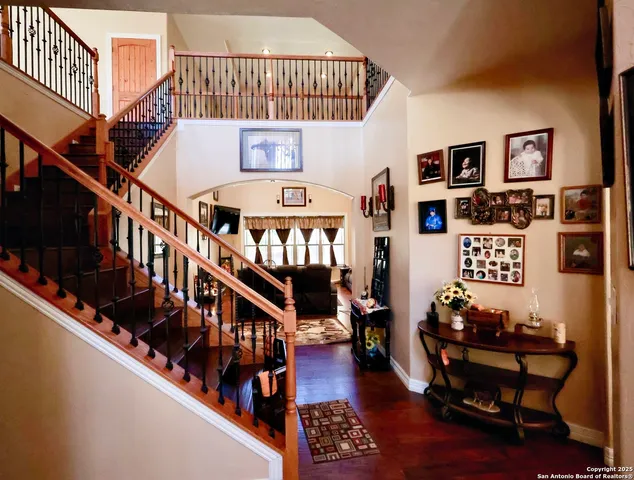a view of entryway livingroom and hall