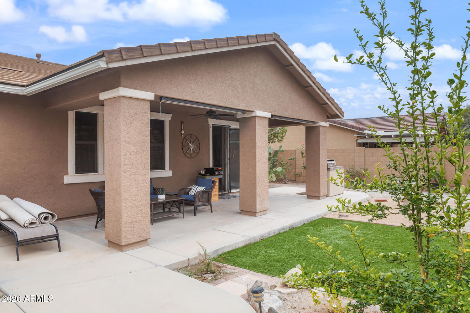3246 North Springfield Street Buckeye, AZ 85396 - Photo 25 of 27 a front view of house with yard