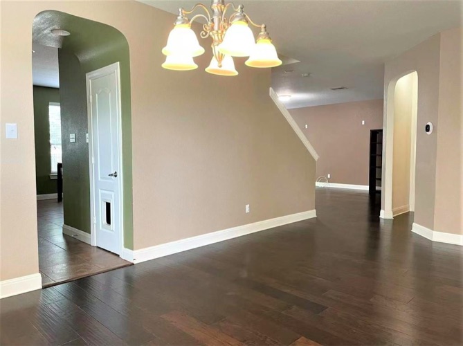 508 Tyree Road Cedar Park, TX 78613 - Photo 5 of 22 a view of a hallway with wooden floor