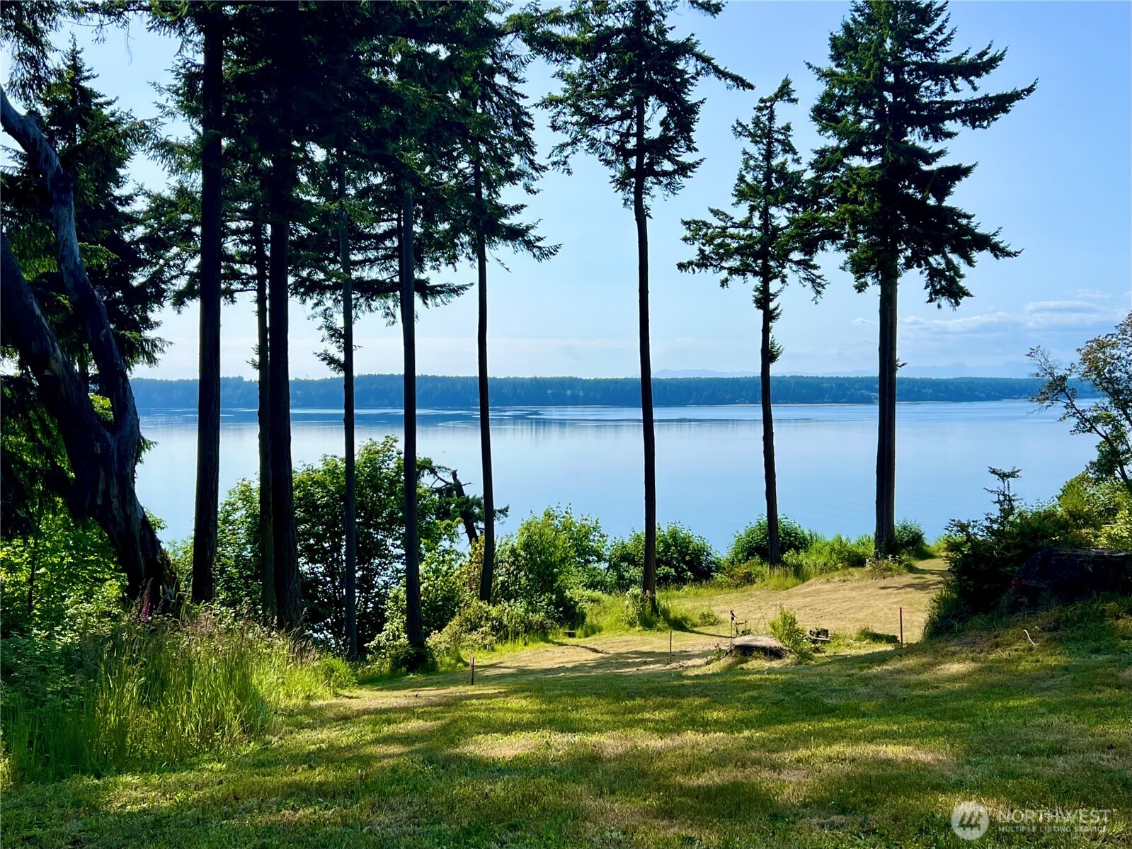 6908 190th Avenue Southwest Longbranch, WA 98351 - Photo 2 of 11 a view of a garden