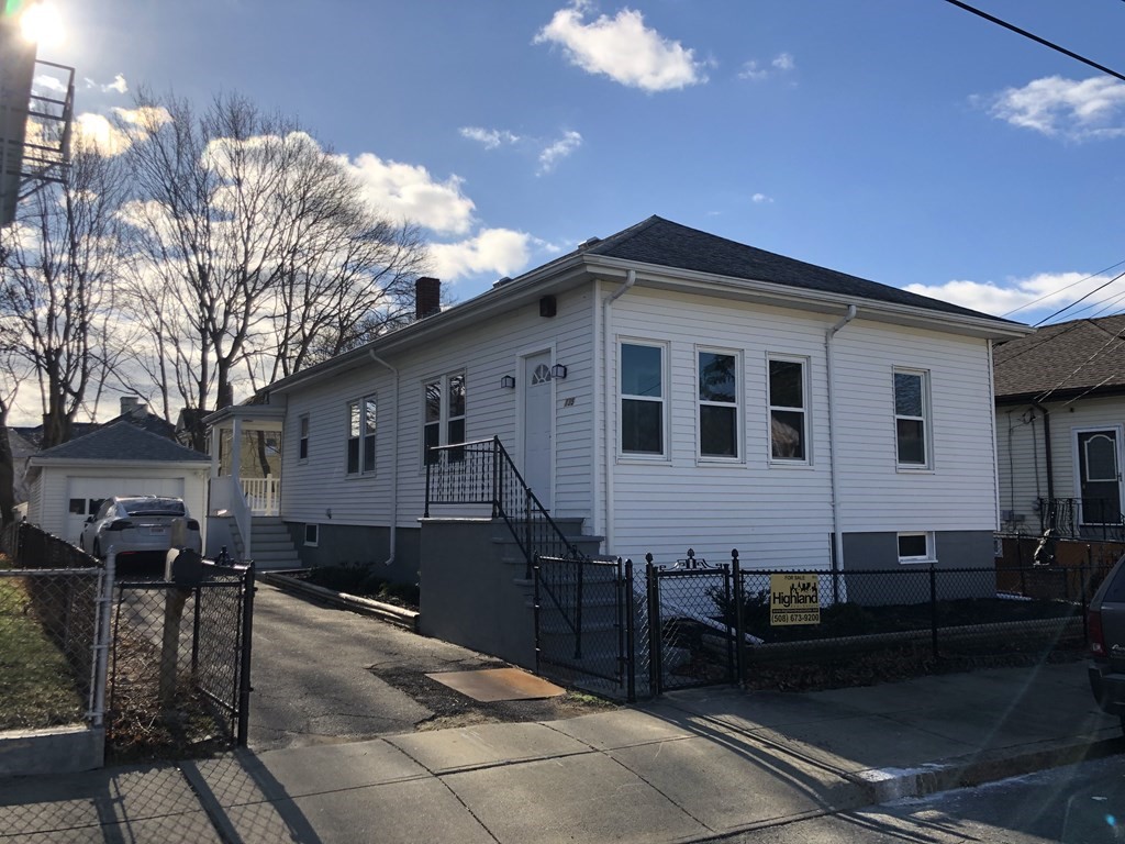 a front view of a house with yard