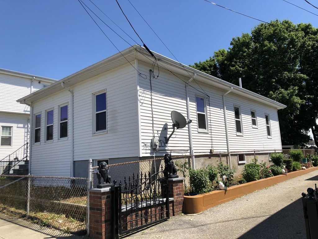 135 Winthrop Street Fall River, MA 02721 - Photo 2 of 26 a view of a house with backyard