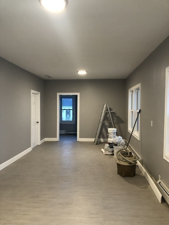 135 Winthrop Street Fall River, MA 02721 - Photo 21 of 26 a view of a room with gym equipment