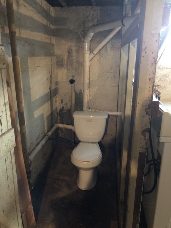 135 Winthrop Street Fall River, MA 02721 - Photo 24 of 26 a bathroom with a toilet and a shower