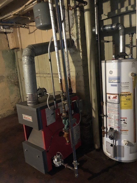 135 Winthrop Street Fall River, MA 02721 - Photo 25 of 26 a room with gym equipment