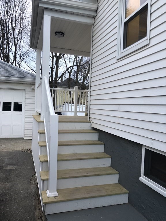 135 Winthrop Street Fall River, MA 02721 - Photo 3 of 26 a view of entryway with a front door