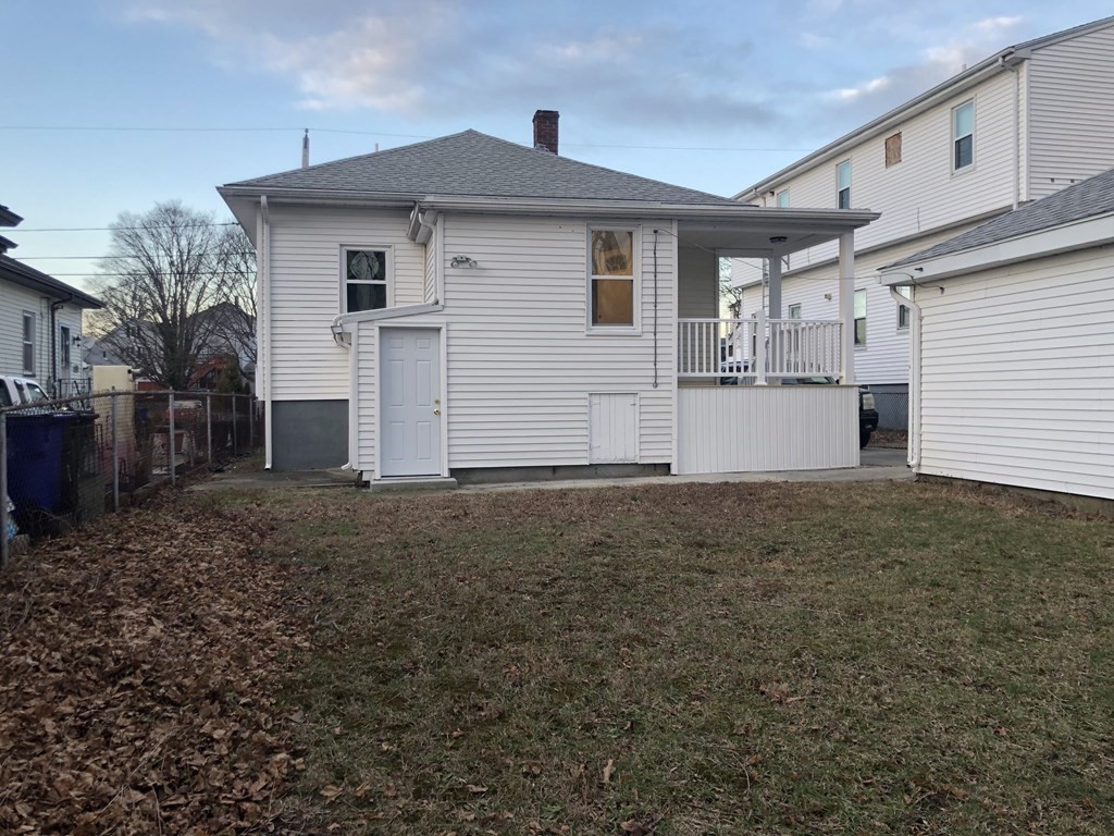 135 Winthrop Street Fall River, MA 02721 - Photo 9 of 26 a view of a house with a backyard