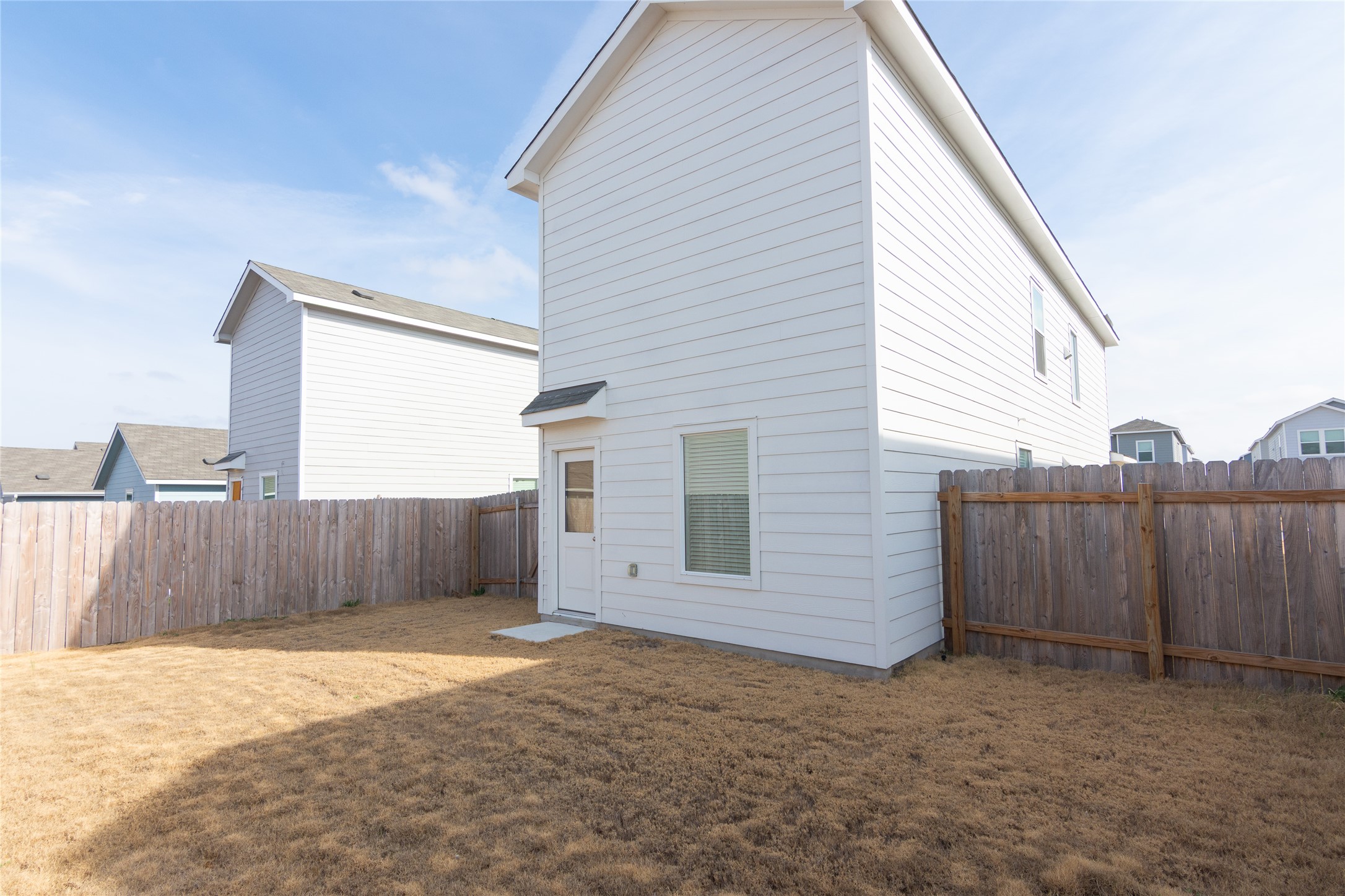 356 Marty Allen Loop Jarrell, TX 76537 - Photo 23 of 33 a view of a backyard