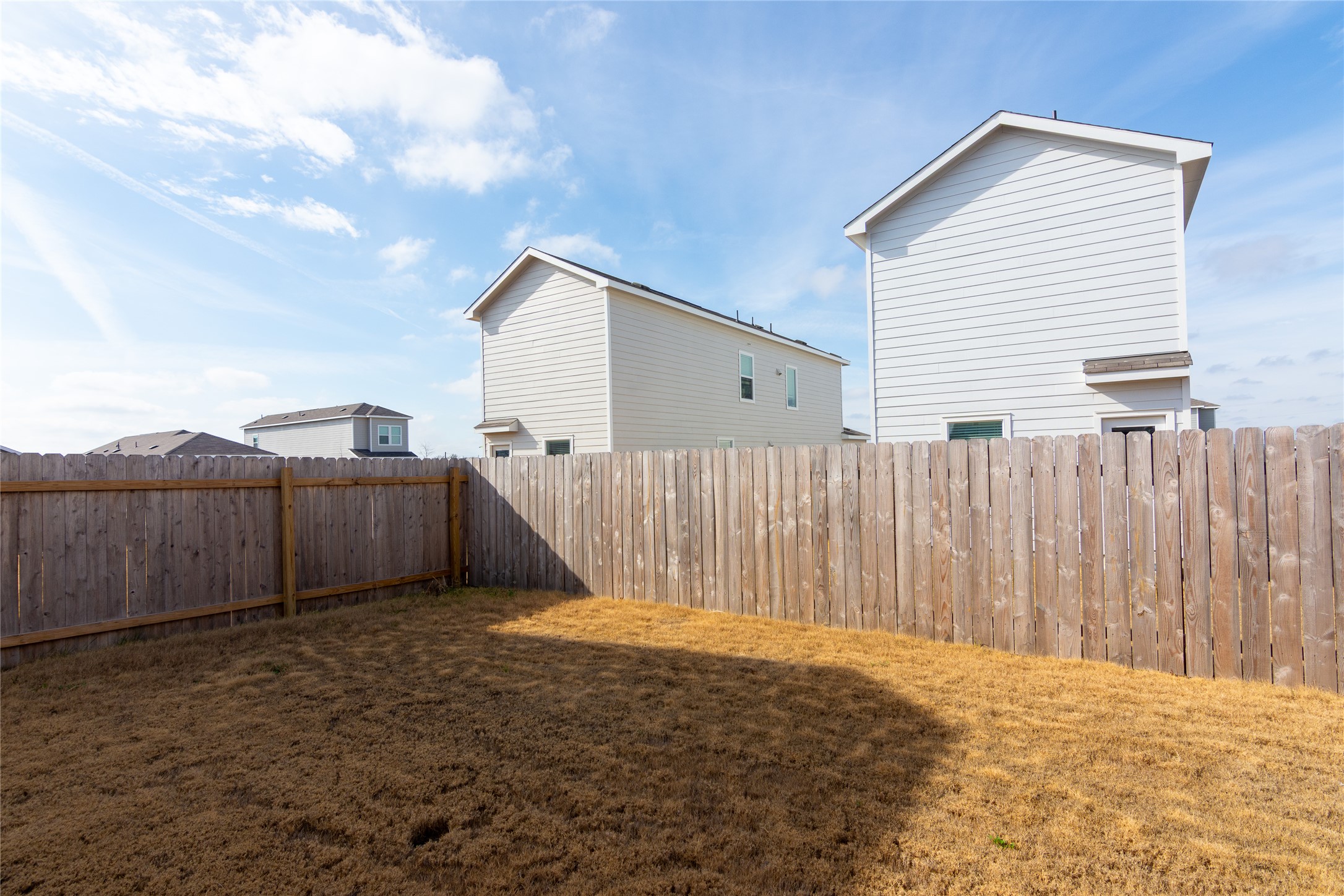356 Marty Allen Loop Jarrell, TX 76537 - Photo 24 of 33 a view of a backyard