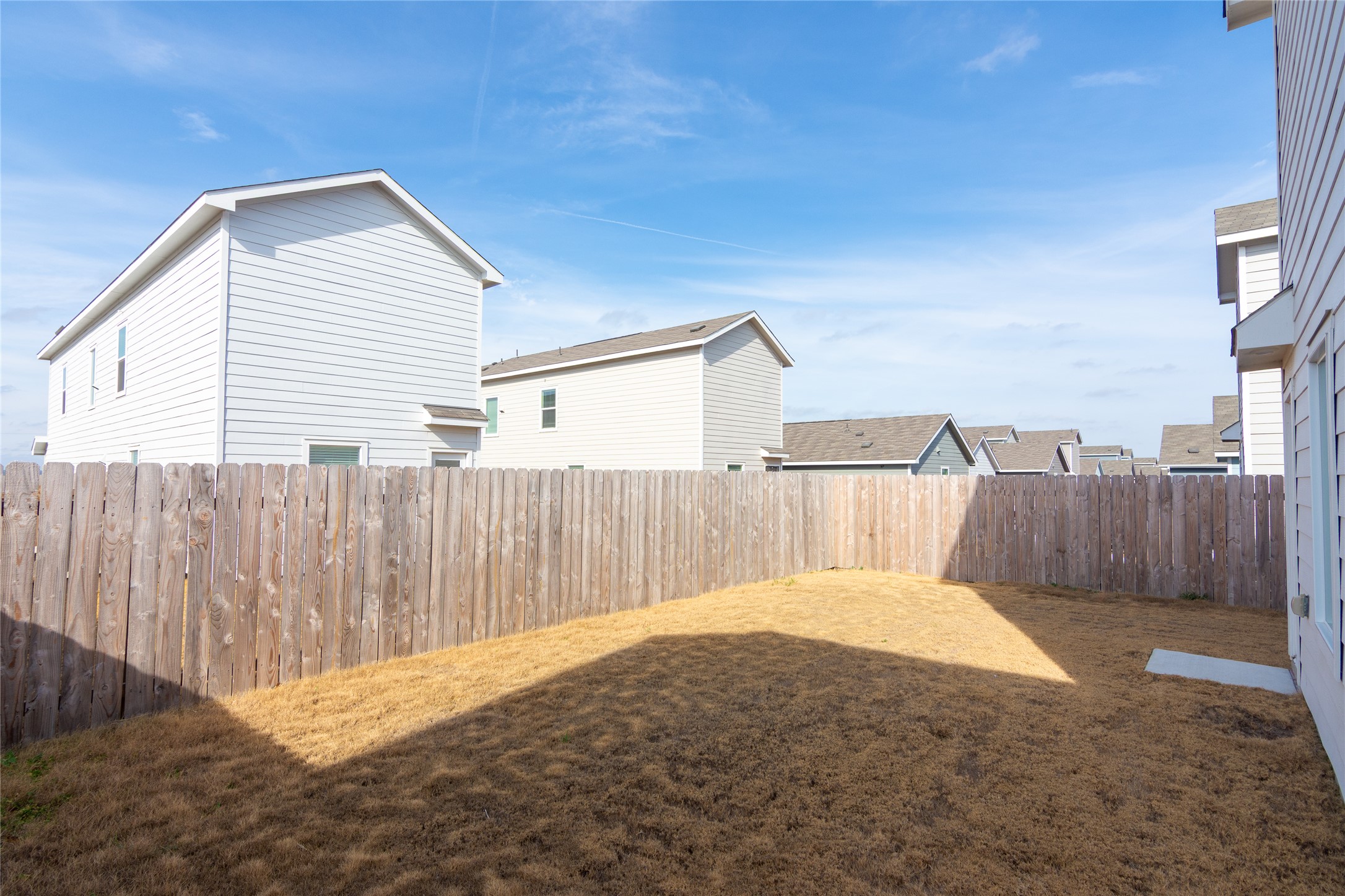356 Marty Allen Loop Jarrell, TX 76537 - Photo 25 of 33 a view of a backyard