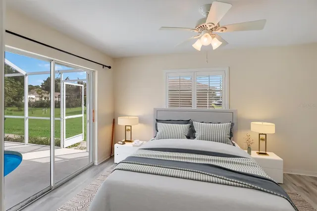 a view of a room with window and wooden floor