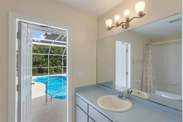 a view of a hallway with windows