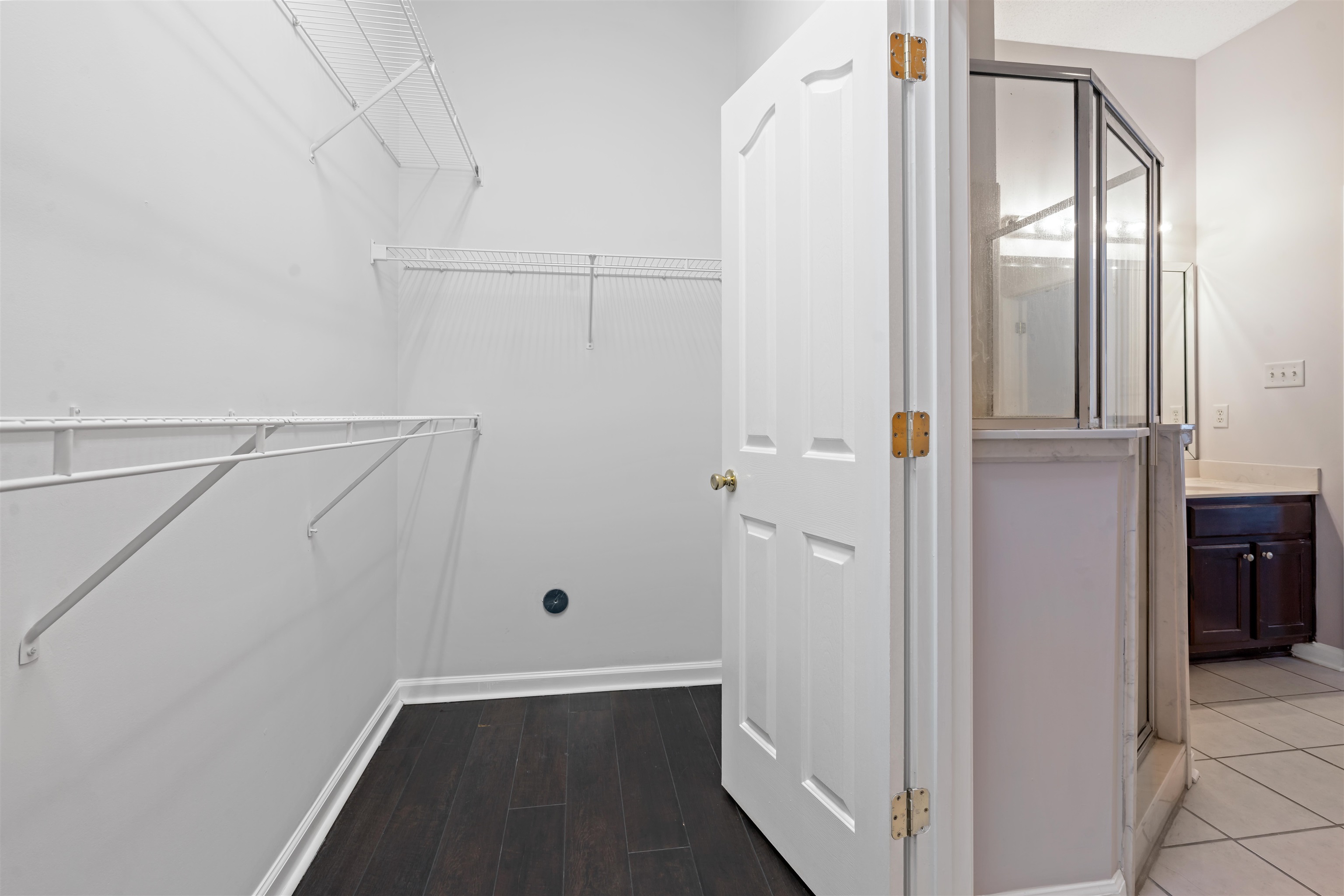 6814 Manslick Road Cordova, TN 38018 - Photo 12 of 20 Spacious closet with hardwood / wood-style floors