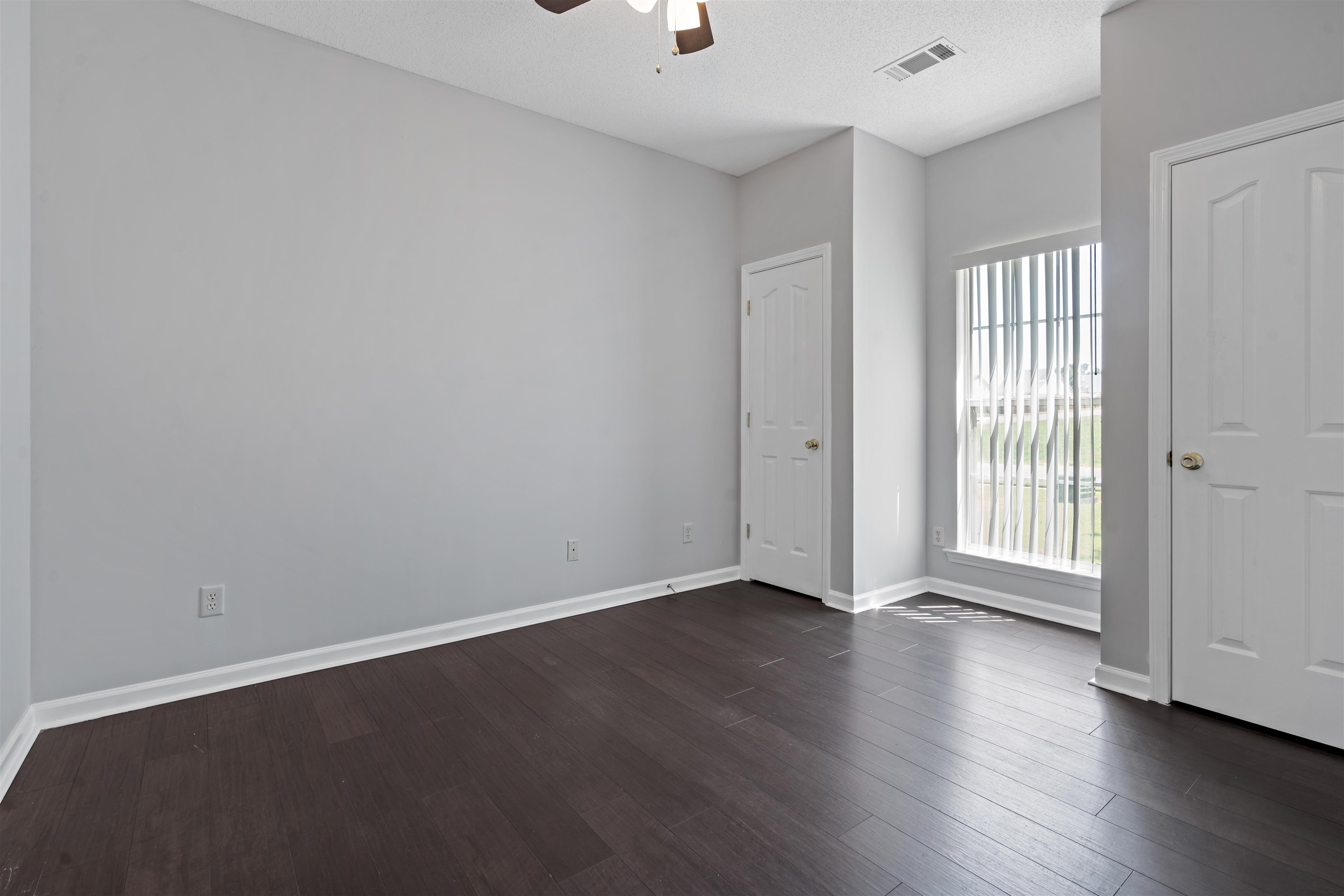 6814 Manslick Road Cordova, TN 38018 - Photo 16 of 20 Interior space featuring ceiling fan and wood-type flooring
