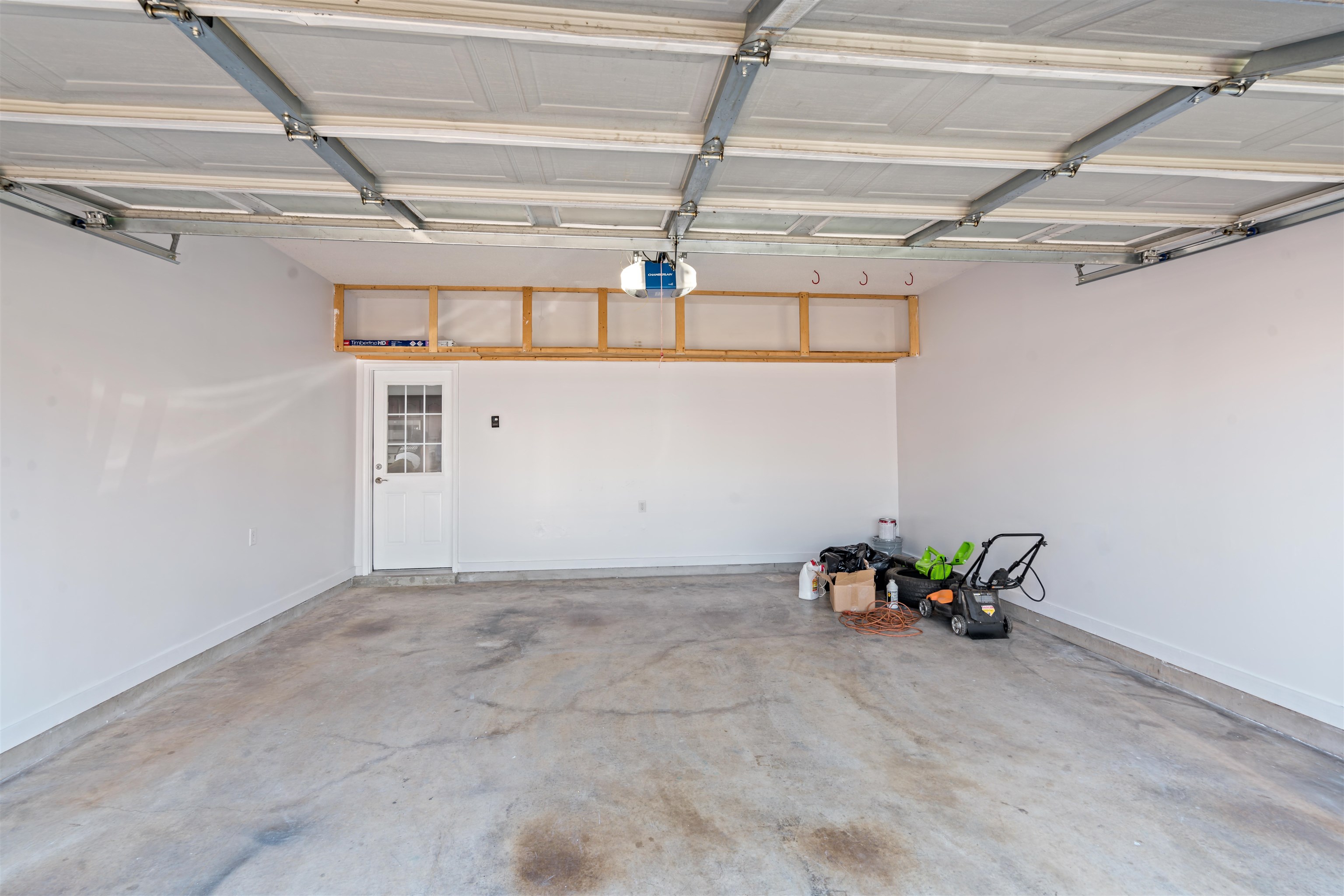 6814 Manslick Road Cordova, TN 38018 - Photo 19 of 20 Garage featuring a garage door opener