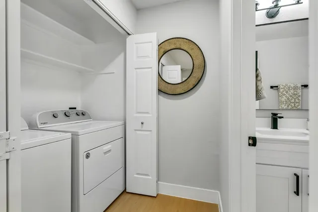 a utility room with dryer and washer
