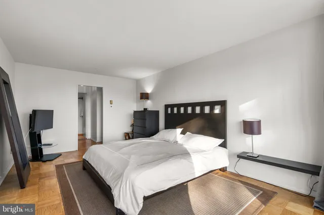 a view of a balcony with wooden fence