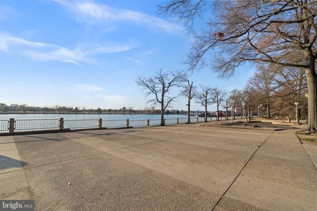 a room with lots of furniture and white walls