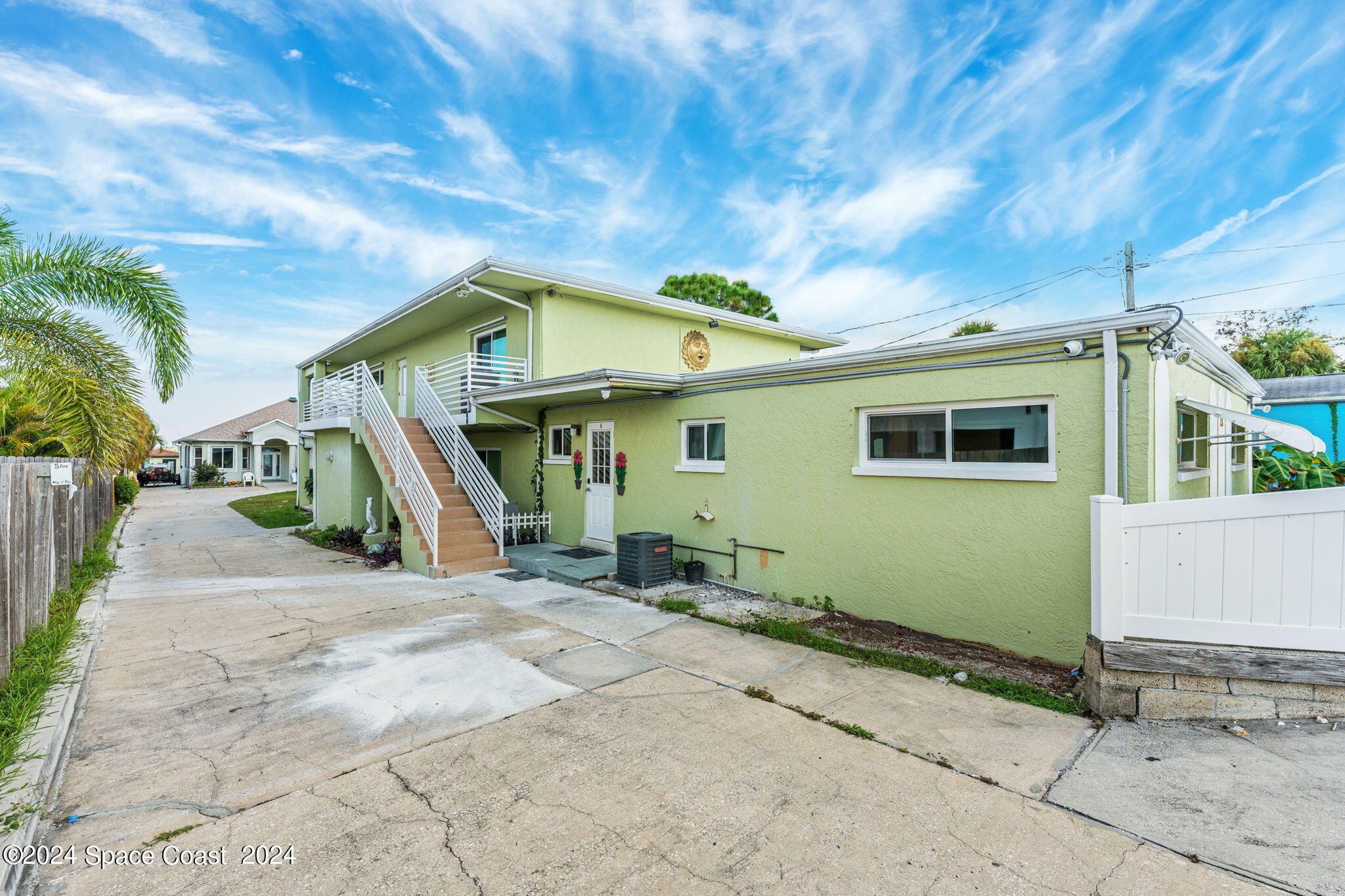 2189 Pineapple Avenue, Unit C Melbourne, FL 32935 - Photo 26 of 67 a view of a house with a park