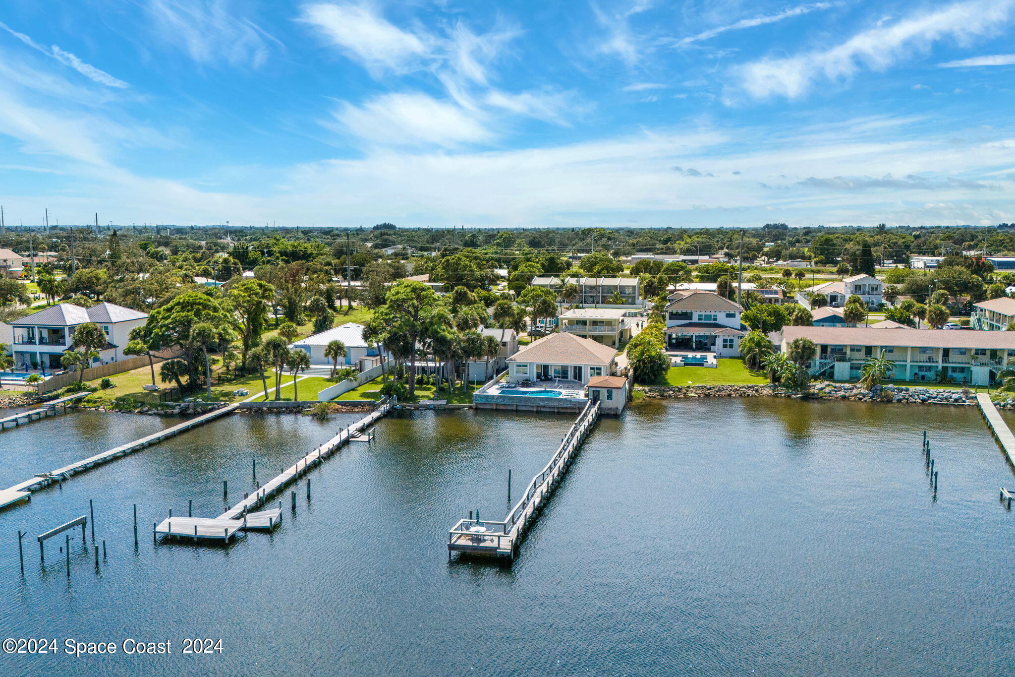 2189 Pineapple Avenue, Unit C Melbourne, FL 32935 - Photo 41 of 67 an aerial view of a residential houses with outdoor space and swimming pool