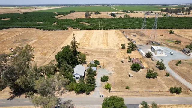 a view of a yard with a mountain view