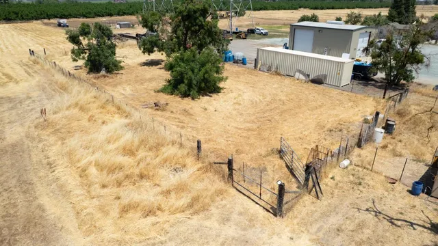 a view of a backyard of a house