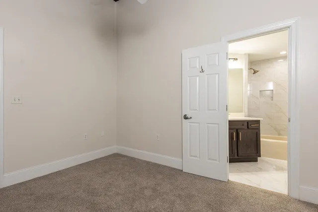 an empty room with a bathroom