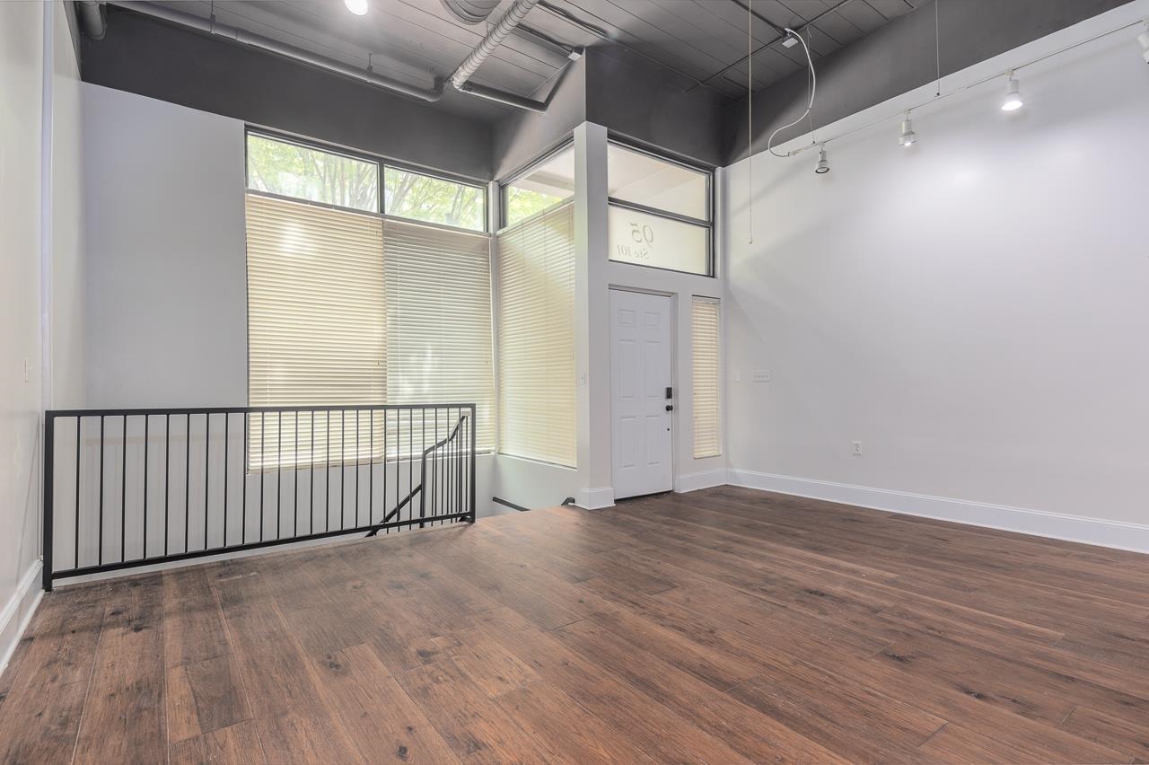 95 South Main Street, Unit 101 Memphis, TN 38103 - Photo 21 of 26 a view of hallway with wooden floor