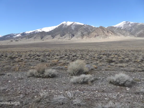 a view of mountain view with mountains in the background