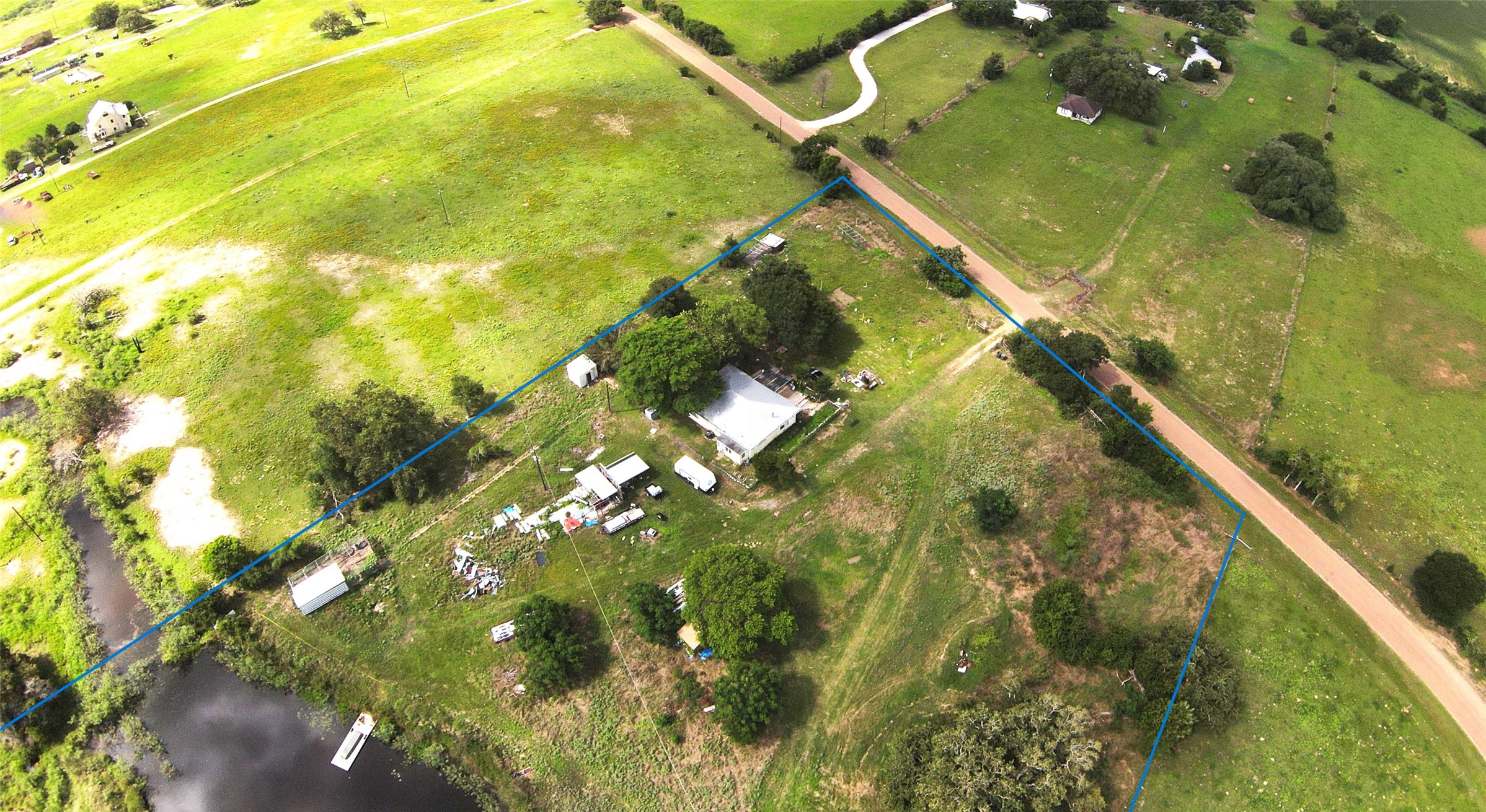 1435 Shaws Bend Road Columbus, TX 78934 - Photo 2 of 36 a picture of lake