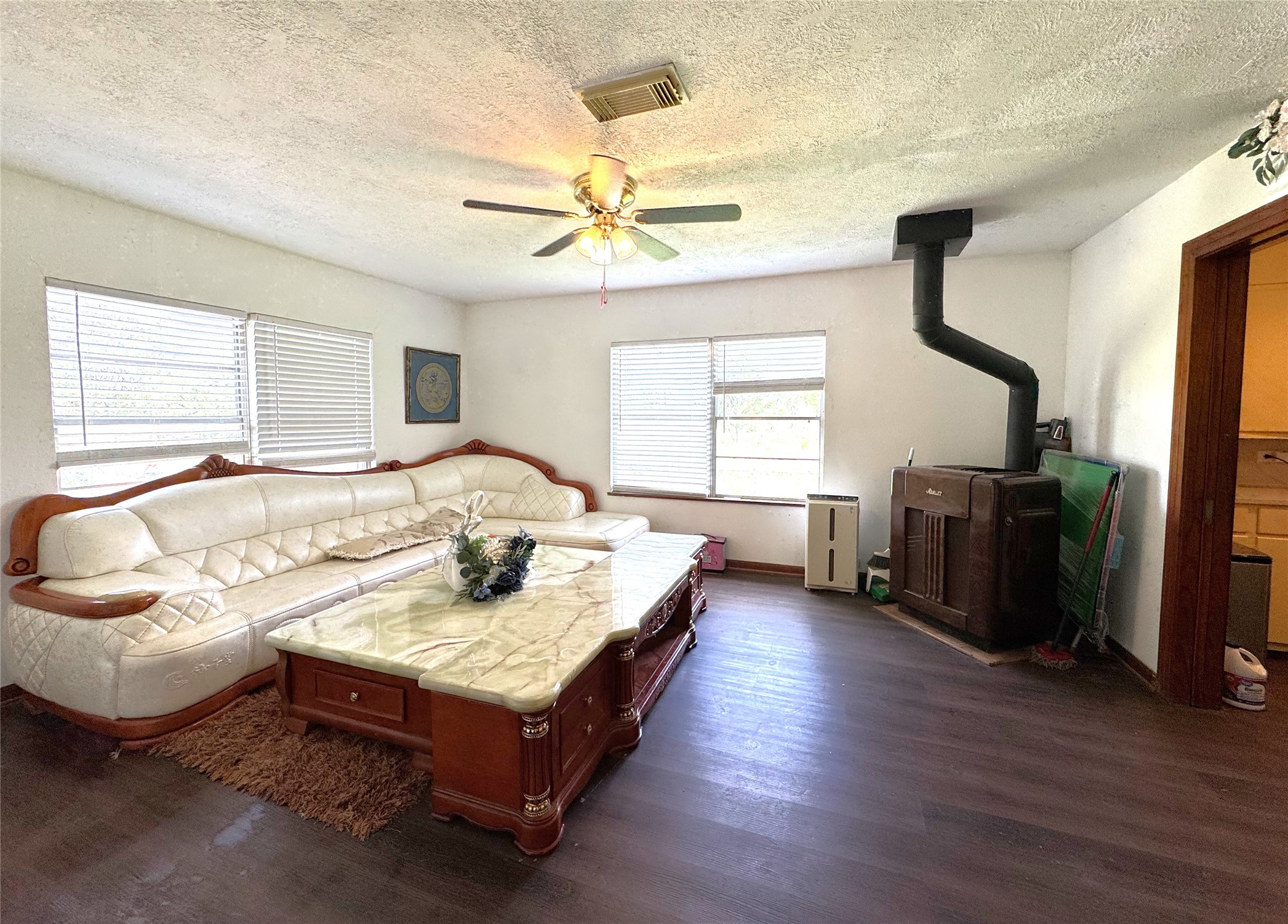 1435 Shaws Bend Road Columbus, TX 78934 - Photo 7 of 36 a living room with furniture fireplace and a window