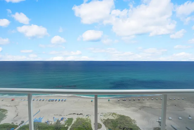 a living room with fireplace furniture and a flat screen tv