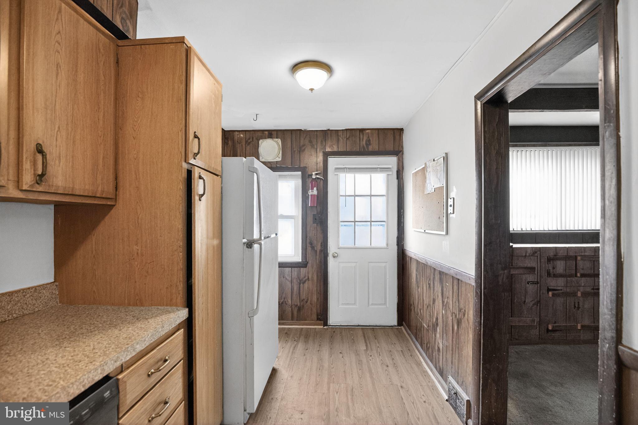 1403 Rainer Road Brookhaven, PA 19015 - Photo 12 of 25 a view of hallway with wooden floor