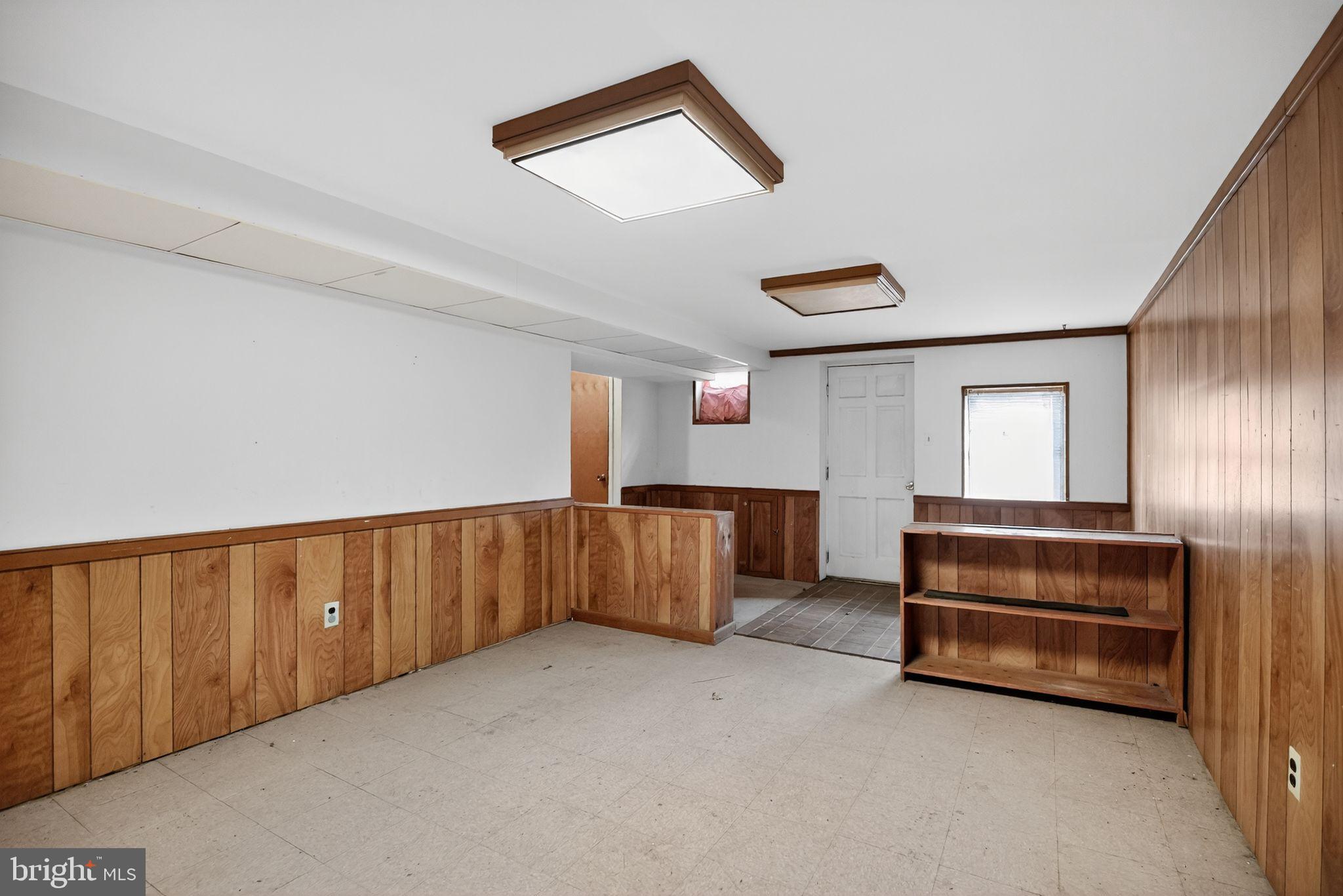 1403 Rainer Road Brookhaven, PA 19015 - Photo 20 of 25 a room with furniture and window