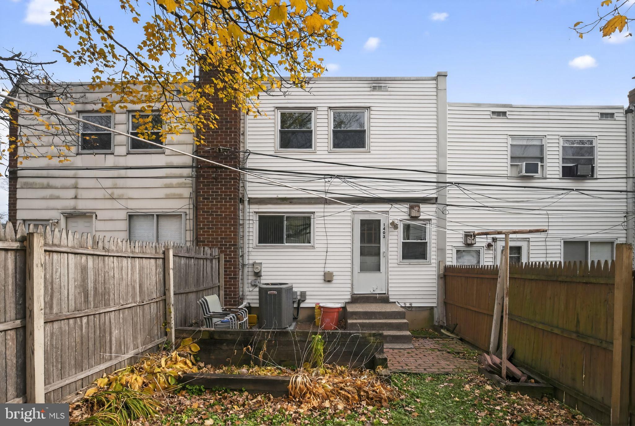 1403 Rainer Road Brookhaven, PA 19015 - Photo 23 of 25 a view of a house with backyard and sitting area