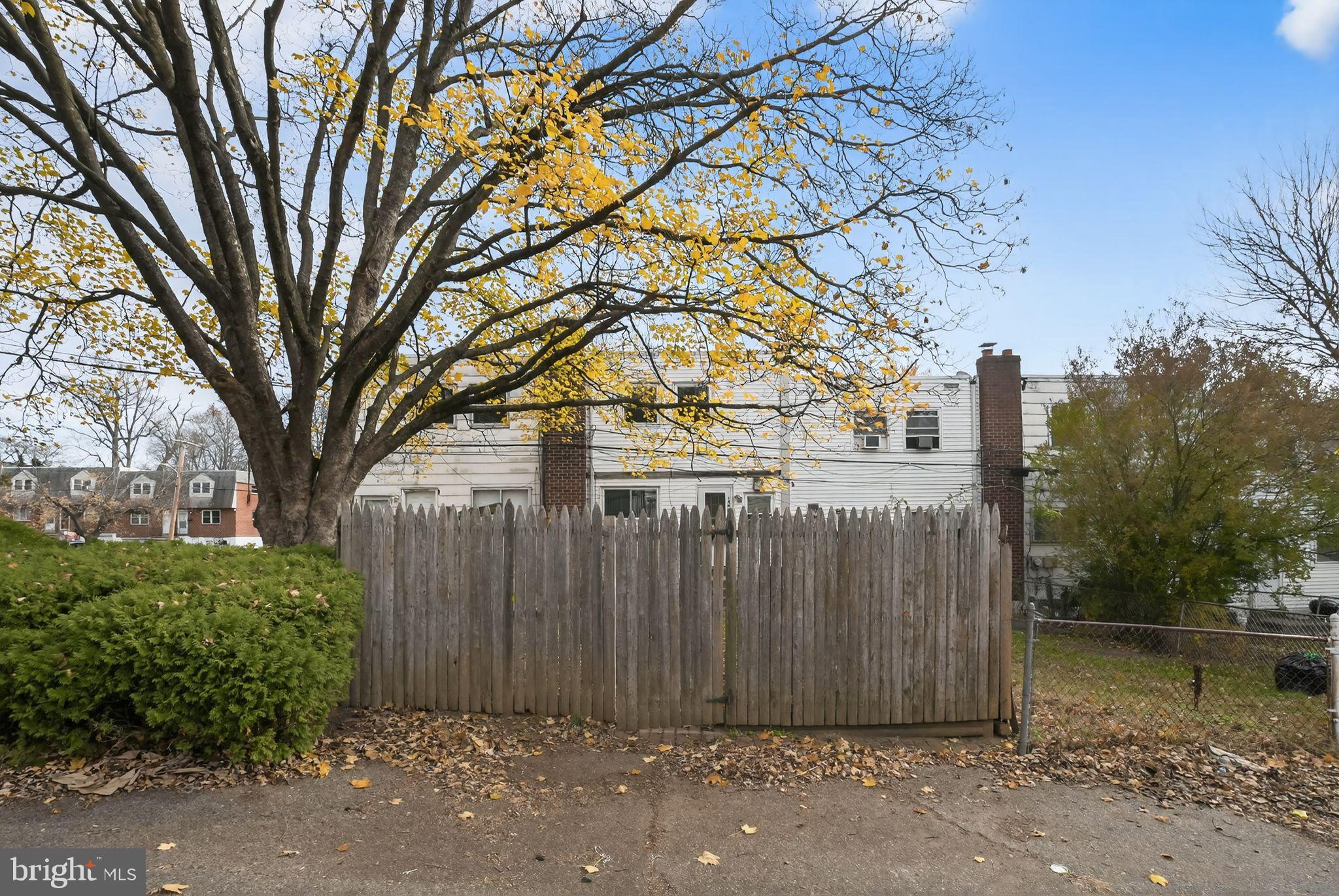 1403 Rainer Road Brookhaven, PA 19015 - Photo 25 of 25 a view of a pathway with a wrought fence