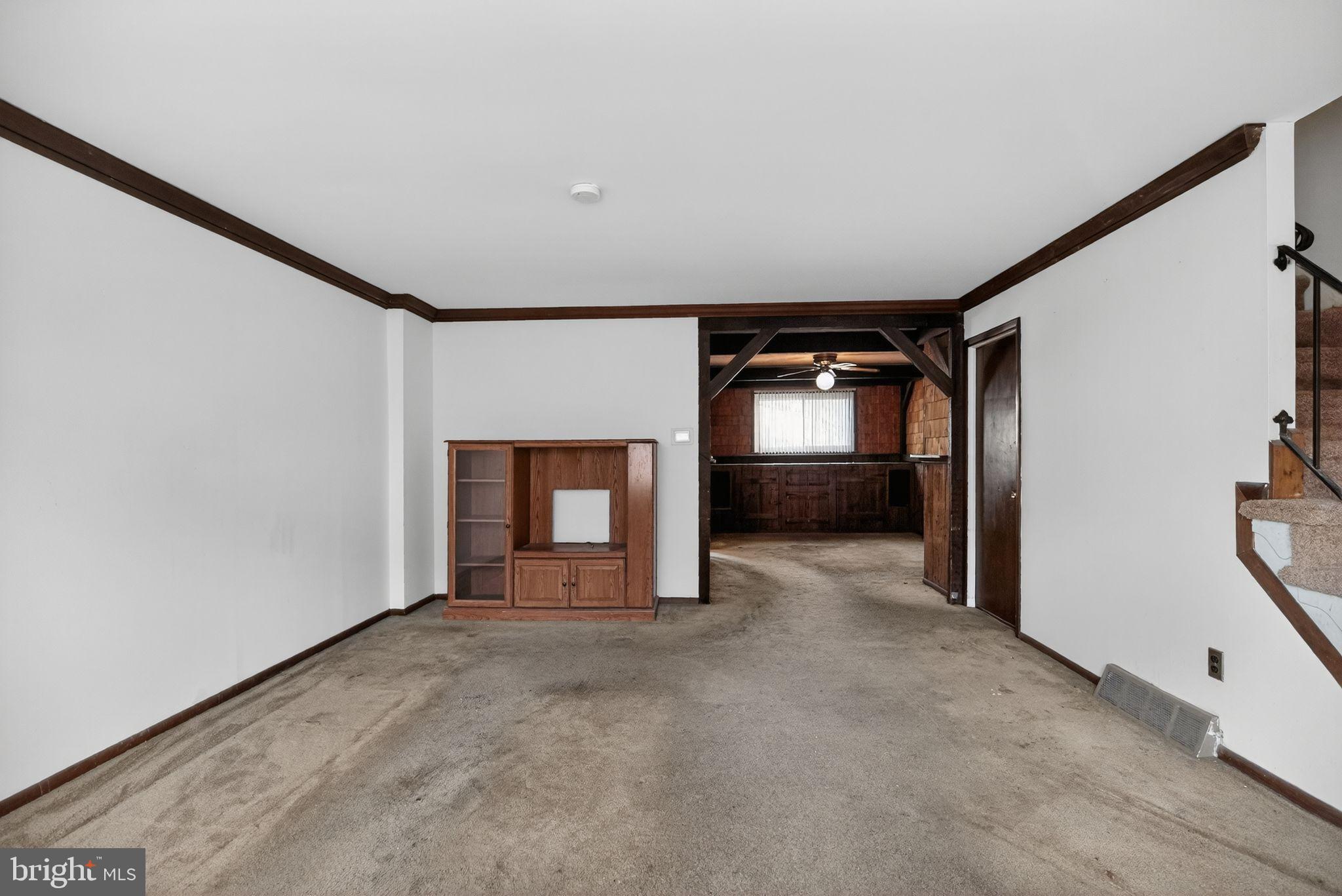 1403 Rainer Road Brookhaven, PA 19015 - Photo 3 of 25 a view of an empty room and a fireplace