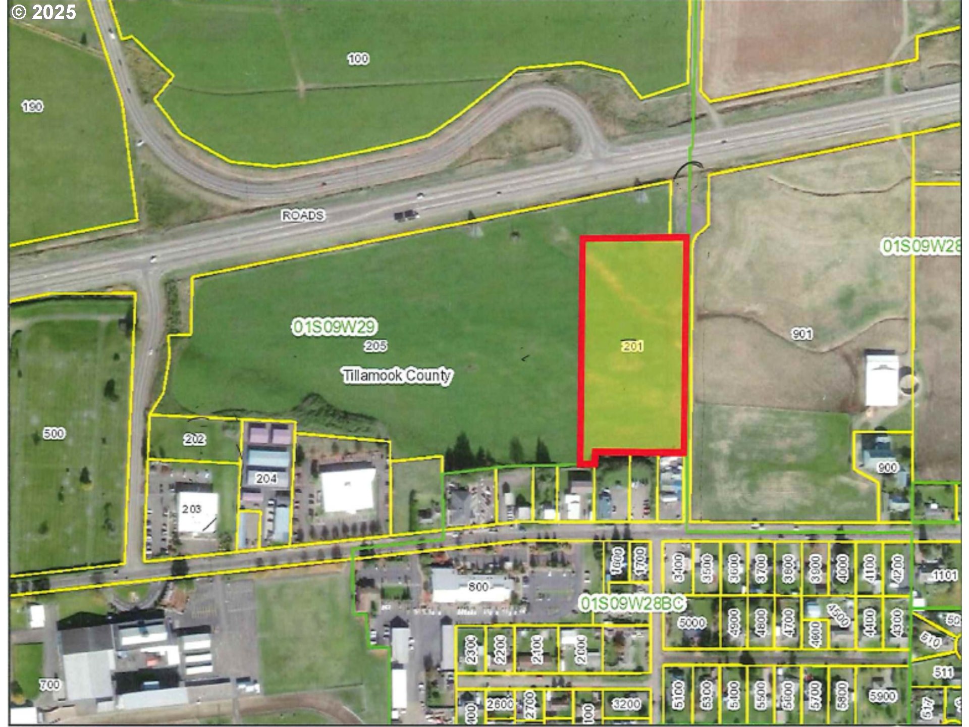 0 Schild Road, Unit 201 Tillamook, OR 97141 - Photo 1 of 1 a front view of a building with outdoor space and seating area