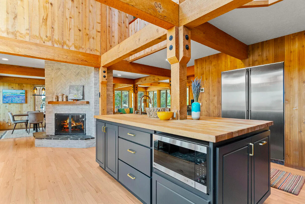 60359 Arnold Market Road Bend, OR 97702 - Photo 18 of 64 refinished hardwood floors throughout kitchen and secondary dining / living spaces