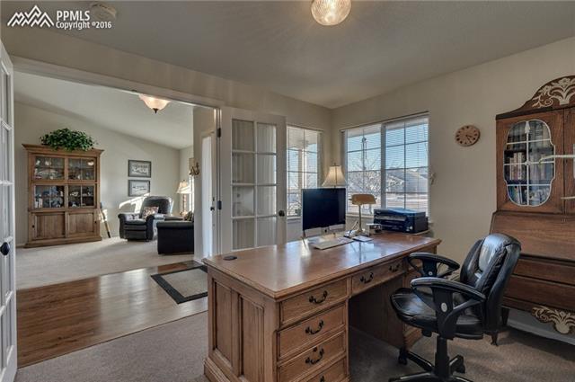 12022 Rio Secco Road Peyton, CO 80831 - Photo 7 of 26 Home Office/Bedroom off the Entry with French Doors