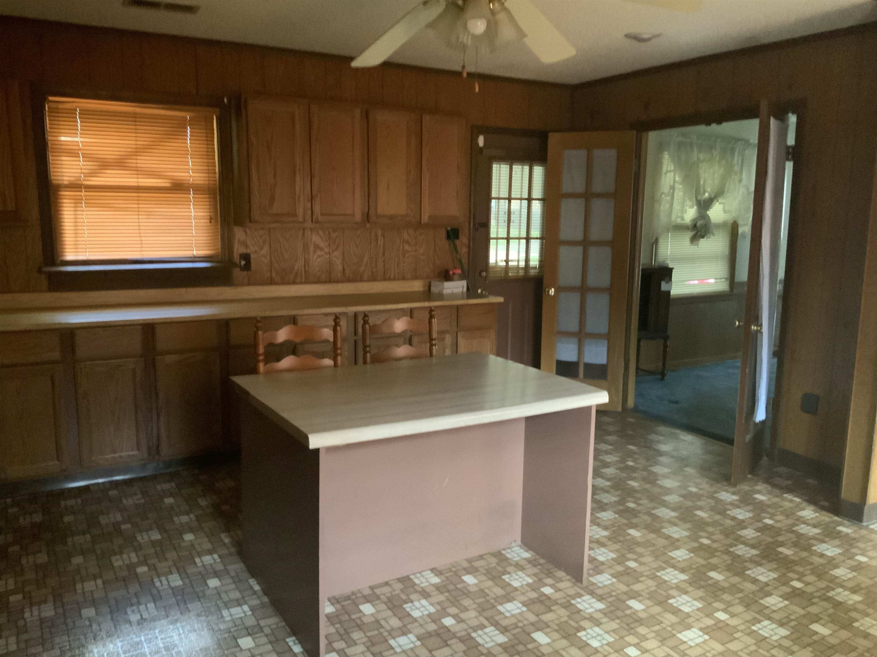 1309 Aubra Road Memphis, TN 38111 - Photo 6 of 19 Kitchen with a ceiling fan and light countertops
