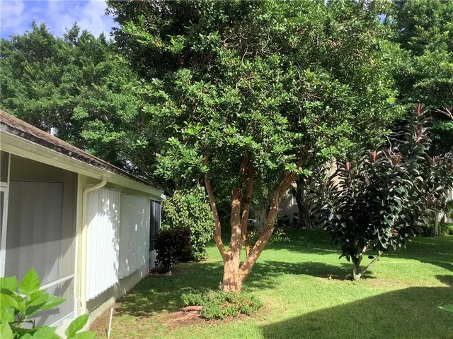 a view of backyard with green space