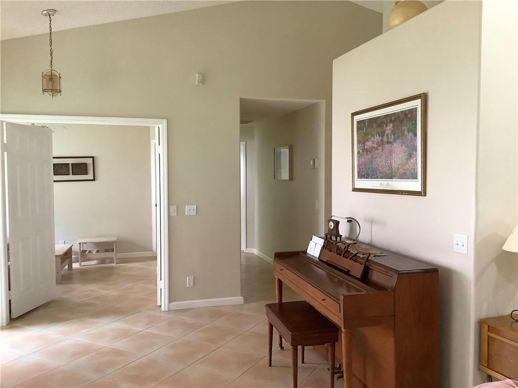 7904 Mansfield Hollow Road Delray Beach, FL 33446 - Photo 3 of 27 a view of a workspace with furniture