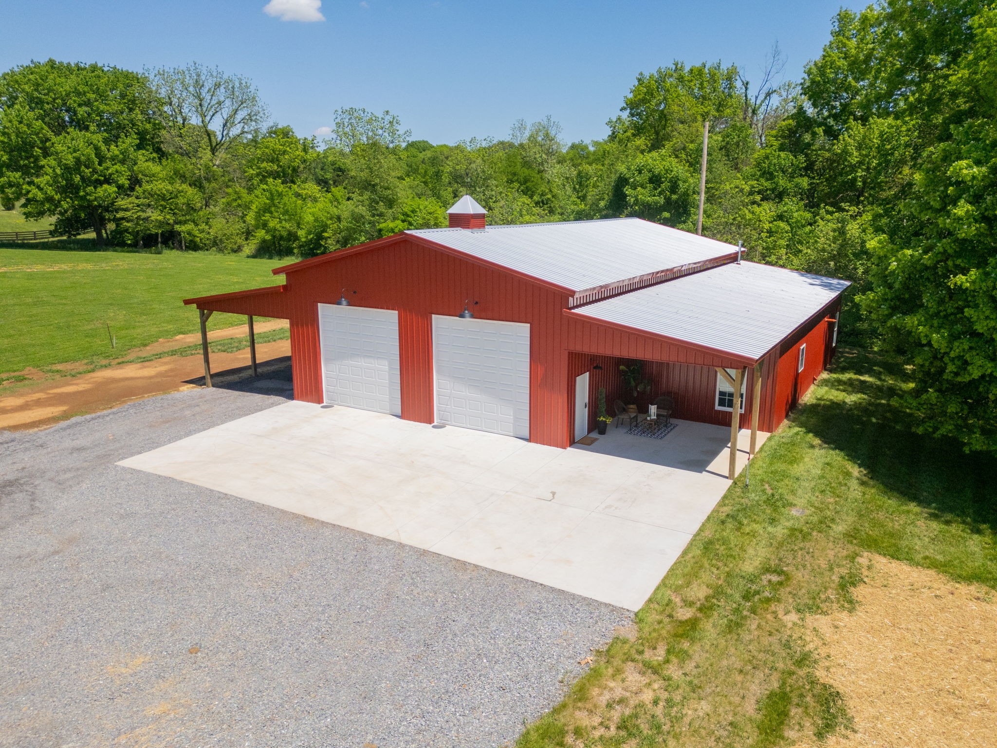 1116 Maxwell Branch Road Cottontown, TN 37048 - Photo 1 of 57 a front view of a house with a yard