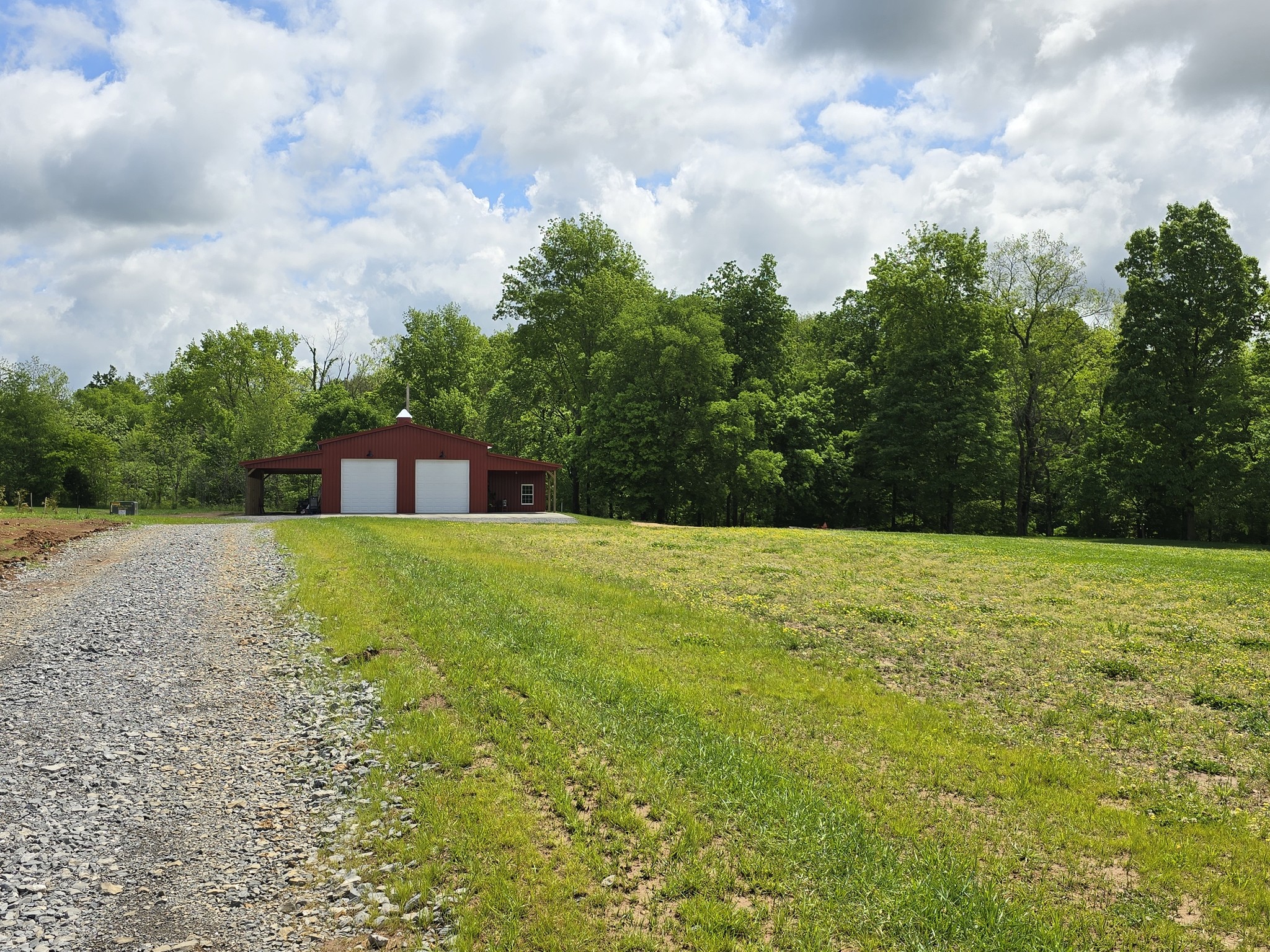1116 Maxwell Branch Road Cottontown, TN 37048 - Photo 20 of 57 Barn is at the back corner of Property