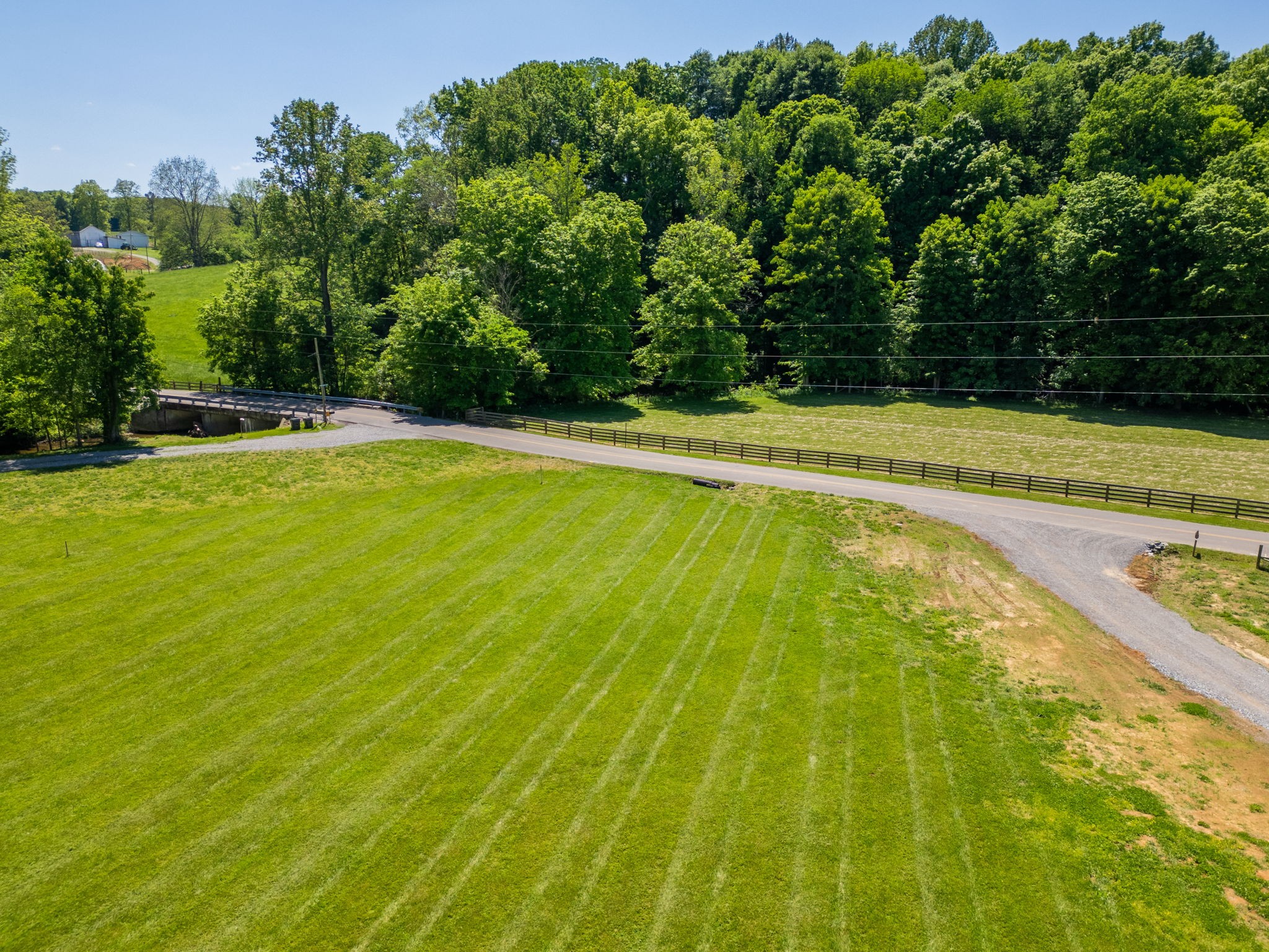 1116 Maxwell Branch Road Cottontown, TN 37048 - Photo 23 of 57 a view of a swimming pool and trees in the background