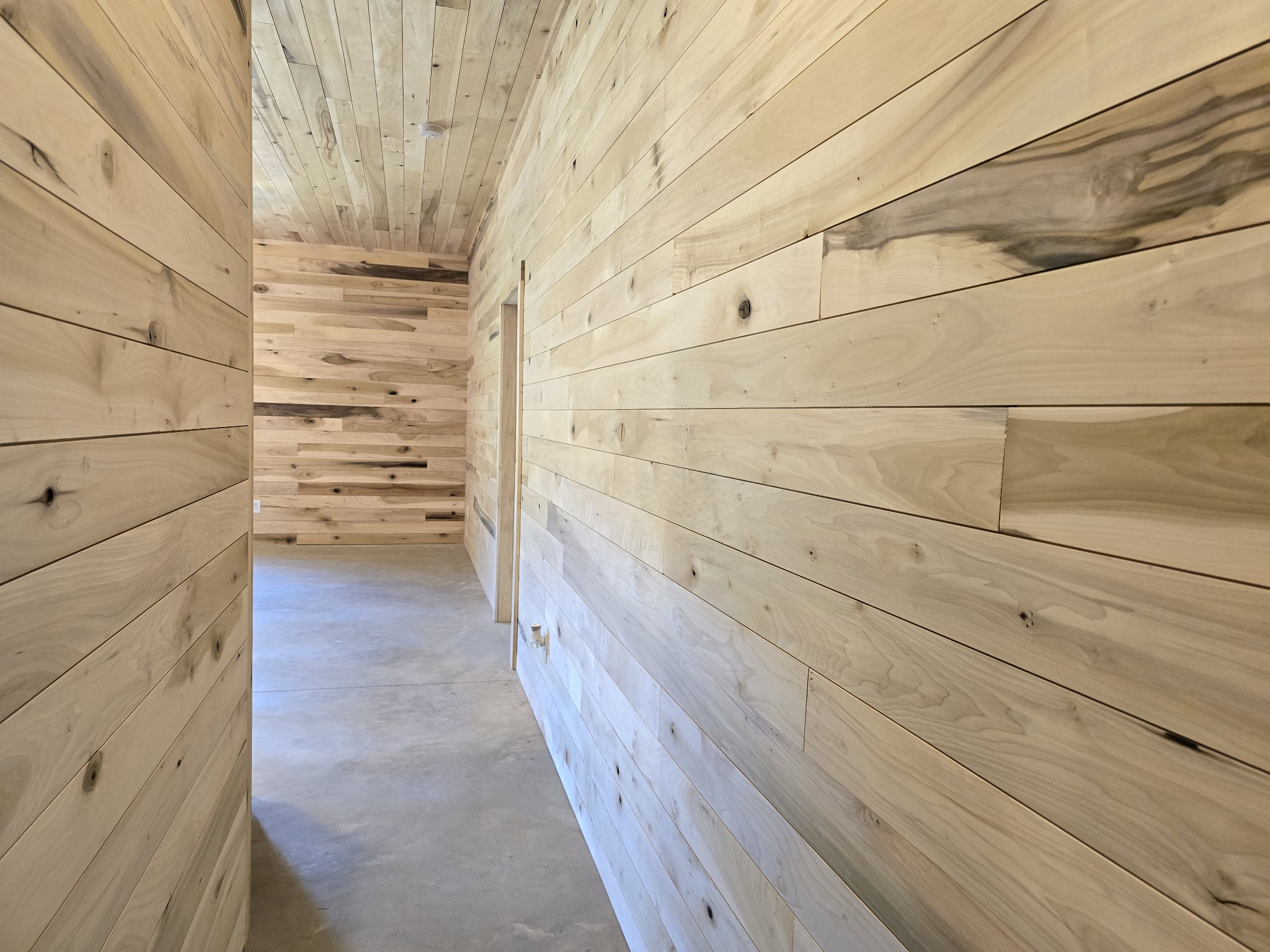 1116 Maxwell Branch Road Cottontown, TN 37048 - Photo 26 of 57 Inside the enclosed section of shed has the Ceilings and Walls lined with Poplar Nickel Gap